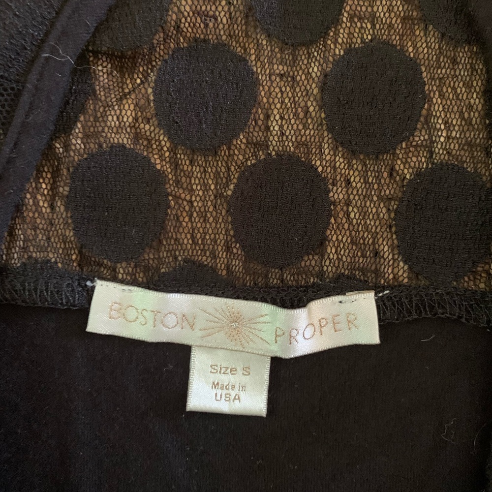 Shortsleeved black knit top by Boston Proper. Made in USA. Size S